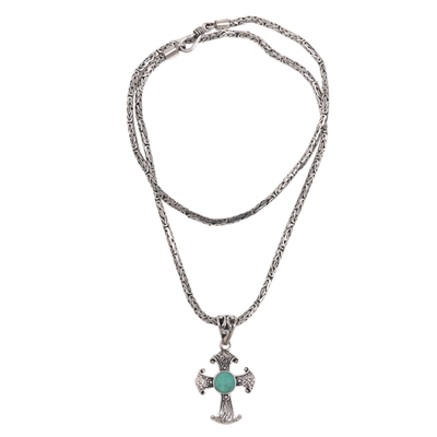 Silver and turquoise pendant necklace, 'Holy Sacrifice in Turquoise' - Artisan Crafted Sterling Silver Necklace with Cross Pendant