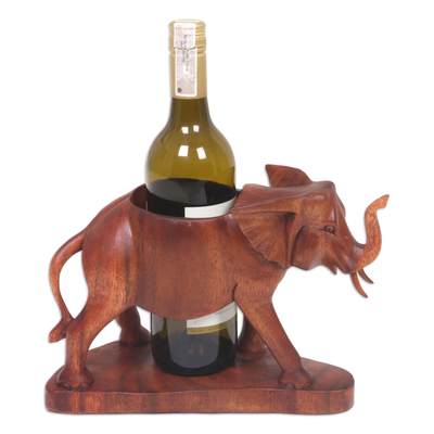 Wood wine bottle holder, 'Sumatran Elephant' - Hand Carved Suar Wood Elephant Wine Bottle Holder