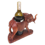 Wood wine bottle holder, 'Sumatran Elephant' - Hand Carved Suar Wood Elephant Wine Bottle Holder