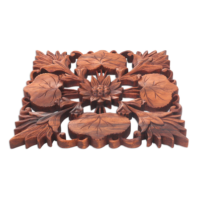 Wood wall panel, 'Lotus Garden' - Artisan Crafted Suar Wood Wall Panel with Floral Motif