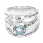 Blue topaz cocktail ring, 'Sparkling Pool' - Blue Topaz Handcrafted Sterling Silver Ring from Bali