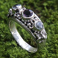 Amethyst and blue topaz cocktail ring, 'Seminyak Blossoms' - Amethyst and Blue Topaz Sterling Silver Floral Ring