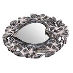 Wall mirror, 'Black Frangipani Heart' - Suar Wood Hand Carved Heart Shaped Floral Wall Mirror