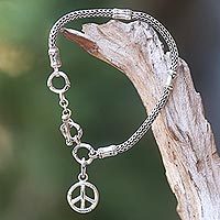 Sterling silver charm bracelet, 'Peaceful Bamboo' - Artisan Crafted Sterling Silver Bracelet with Peace Charm