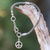 Sterling silver charm bracelet, 'Peaceful Bamboo' - Artisan Crafted Sterling Silver Bracelet with Peace Charm (image 2) thumbail