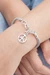 Sterling silver charm bracelet, 'Peaceful Bamboo' - Artisan Crafted Sterling Silver Bracelet with Peace Charm