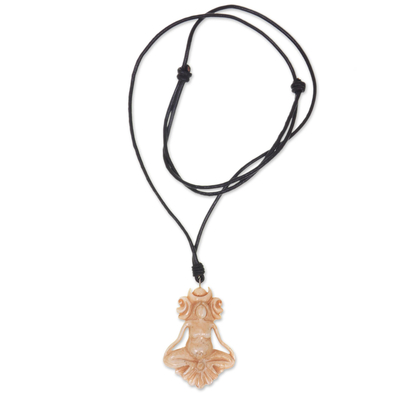 Bone and leather pendant necklace, 'Serene Meditation' - Hand Crafted Cow Bone Pendant on Leather Cord Necklace