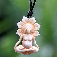 Bone and leather pendant necklace, 'Peace Before Birth' - Hand Carved Bone and Leather Mother Necklace from Bali