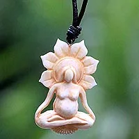 Bone and leather pendant necklace, 'Peace Before Birth' - Hand Carved Bone and Leather Mother Necklace from Bali