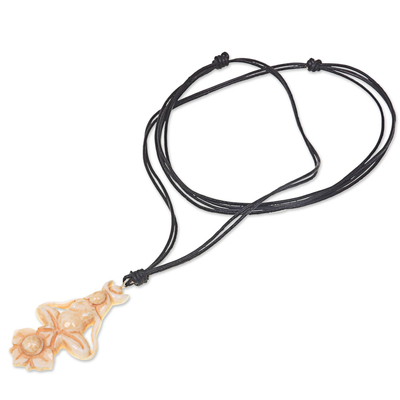 Bone and leather pendant necklace, 'Ancient Meditation' - Artisan Crafted Leather Cord Necklace with Cow Bone Pendant