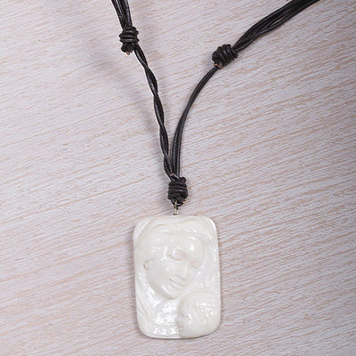Bone and leather pendant necklace, 'Loving Virgin Mary' - Artisan Crafted Virgin Mary Medallion Necklace