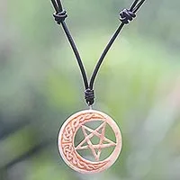 Bone and leather pendant necklace, 'Celtic Moon Star' - Hand Carved Moon and Star Necklace in Leather and Bone