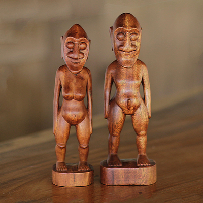 Holzskulpturen, (Paar) - Paar Mann- und Frauenskulpturen aus Suar-Holz aus Bali