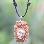 Bone and leather pendant necklace, 'Dragon's Daughter' - Hand Carved Dragon Theme Necklace in Leather and Bone
