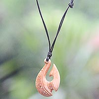 Bone and leather pendant necklace, 'Antique Fish Hook' - Black Bone Unisex Hand Carved Bone Necklace