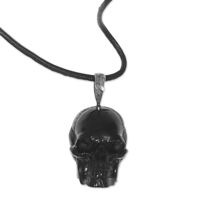 Bone pendant necklace, 'Black Skull' - Carved Bone Skull Pendant on Cord Handmade in Indonesia