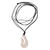 Bone pendant necklace, 'Balinese Fish Hook' - Fish Hook Bone Pendant Necklace with Leather Cord from Bali thumbail