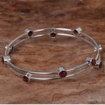 Garnet bangle bracelet, 'Orchid Twist in Red' - Hand Made Sterling Silver Garnet Bracelet Indonesia
