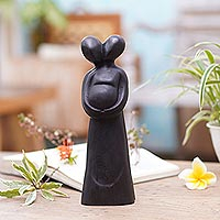 Featured review for Wood statuette, Our Baby