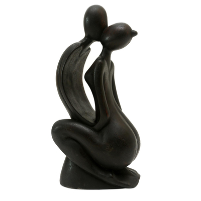 Wood statuette, 'Eternal Kiss' - Hand Carved Suar Wood Statuette of Man and Woman in Black