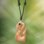 Bone pendant necklace, 'Rippled' - Abstract Bone Pendant Necklace with Leather Cord from Bali