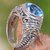 Gold accent blue topaz cocktail ring, 'Rembulan Sparkle' - Handcrafted Gold Accent Sterling Silver Ring with Blue Topaz (image 2) thumbail