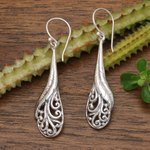 Sterling silver dangle earrings, 'Floating Peacock Feathers' - Hand Made Sterling Silver Feather Dangle Earrings Indonesia