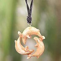 Bone and leather pendant necklace, 'Frolicking Whales'