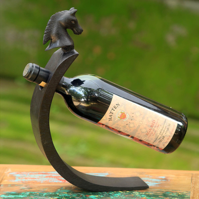 Wood wine bottle holder, 'Black Balinese Pony' - Black Horse Theme Bali Carved Wood Wine Bottle Holder