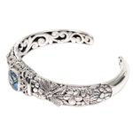 Blue topaz cuff bracelet, 'Sacred Garden in Blue' - Blue Topaz and Sterling Silver Cuff Bracelet from Indonesia