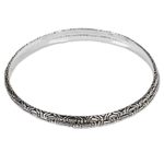 Sterling silver bangle bracelets, 'Indonesian Moon' (pair) - Two 925 Sterling Silver Handmade Engraved Bangles from Bali