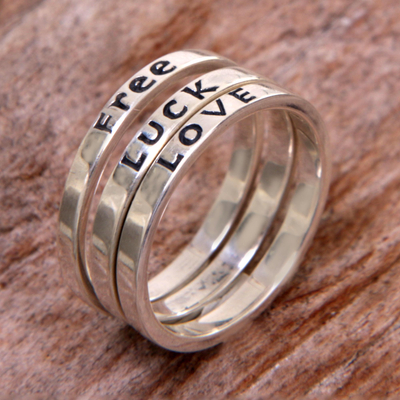 Sterling silver stacking rings, 'Free Luck Love' (set of 3) - Balinese Inspirational Silver Stacking Rings (Set of 3)