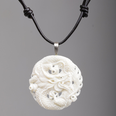 Bone pendant necklace, 'Guard Dragon' - Hand Carved Bone Pendant Necklace Dragon from Indonesia