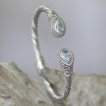Blue topaz cuff bracelet, 'Bright Eyes' - Sterling Silver Blue Topaz Cuff Bracelet from Indonesia