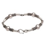 Sterling silver link bracelet, 'Tubes' - Sterling Silver Link Bracelet with Balinese Designs