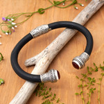 Garnet cuff bracelet, 'Untouched Romance' - Garnet Sterling Silver Rubber Cuff Bracelet from Indonesia