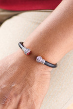 Garnet cuff bracelet, 'Untouched Romance' - Garnet Sterling Silver Rubber Cuff Bracelet from Indonesia