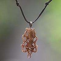 Bone pendant necklace, 'Ocean Dweller' - Hand Made Bone Pendant Necklace Octopus from Indonesia