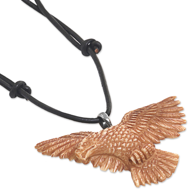 Bone pendant necklace, 'Stoic Eagle' - Hand Made Bone Pendant Necklace Eagle from Indonesia