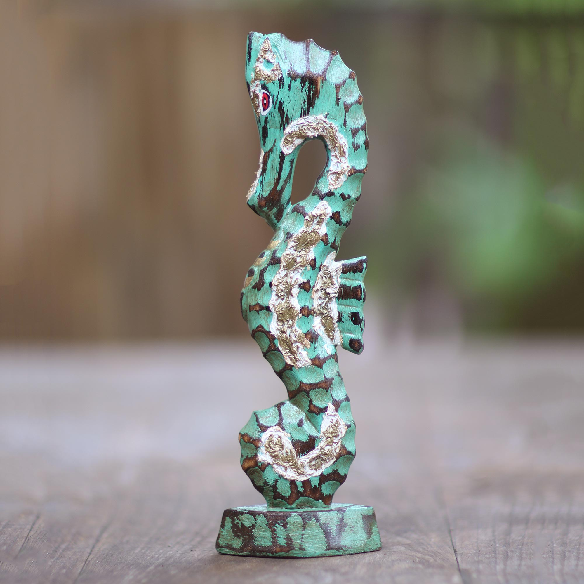 wooden seahorse statue