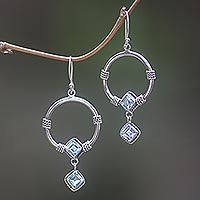Blue topaz dangle earrings, 'Rings of Happiness in Blue' - Sterling Silver Blue Topaz Dangle Earrings from Indonesia
