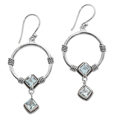 Blue topaz dangle earrings, 'Rings of Happiness in Blue' - Sterling Silver Blue Topaz Dangle Earrings from Indonesia