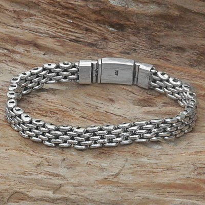 Sterling silver wristband bracelet, 'Sterling Solidarity' - Hand Made Sterling Silver Wristband Bracelet from Indonesia
