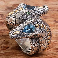 Featured review for Gold accented blue topaz and tsavorite cocktail ring, Serpentine Heads