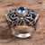 Gold accented blue topaz cocktail ring, 'Whimsical Sea' - Artisan Crafted Gold Accent Blue Topaz Cocktail Ring