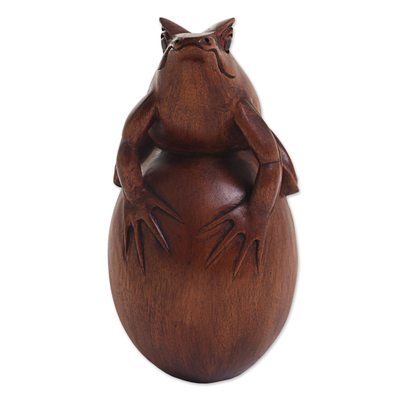 Wood sculpture, 'Proud Frog' - Hand Carved Suar Wood Frog on Pebble Sculpture