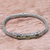 Gold accent peridot braided bracelet, 'Bedugul Temple' - Peridot and Sterling Silver Bracelet with 18k Gold Accents thumbail