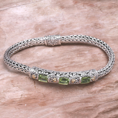 Gold accent peridot braided bracelet, 'Bedugul Temple' - Peridot and Sterling Silver Bracelet with 18k Gold Accents