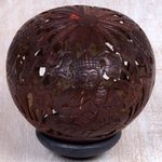 Coconut shell sculpture, 'Buddha's Lore' - Coconut Shell Sculpture on Stand with Buddha Carving