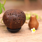 Coconut shell sculpture, 'Buddha's Lore' - Coconut Shell Sculpture on Stand with Buddha Carving